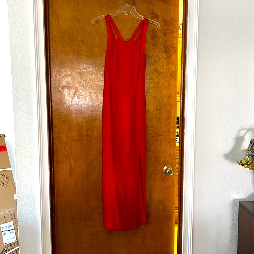 Rich Red evening gown with satin trim around neckline and back!